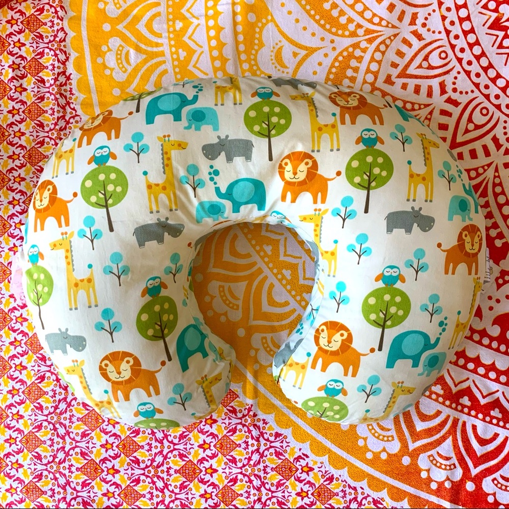 Boppy Pillow with Two Boppy Pillow Cases aka Slip Covers Included.